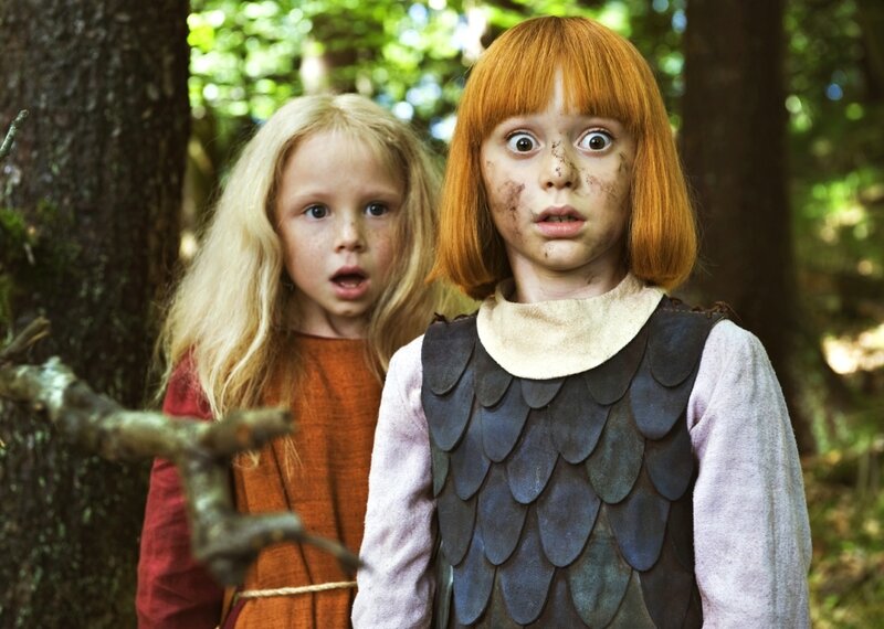Two children in a forest