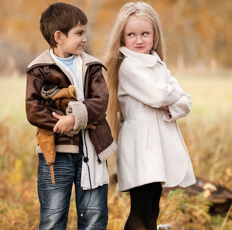 Two Children in Coats