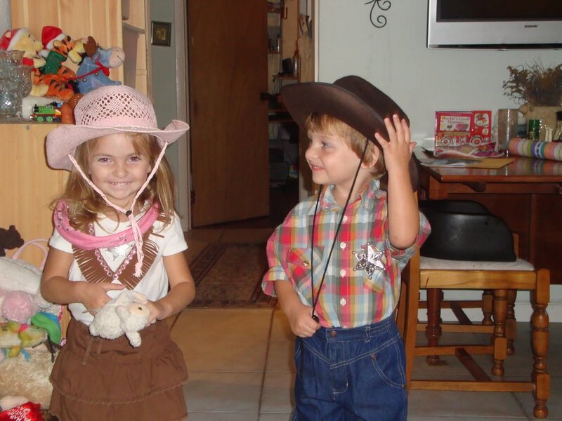 Two Children in Cowboy Costumes