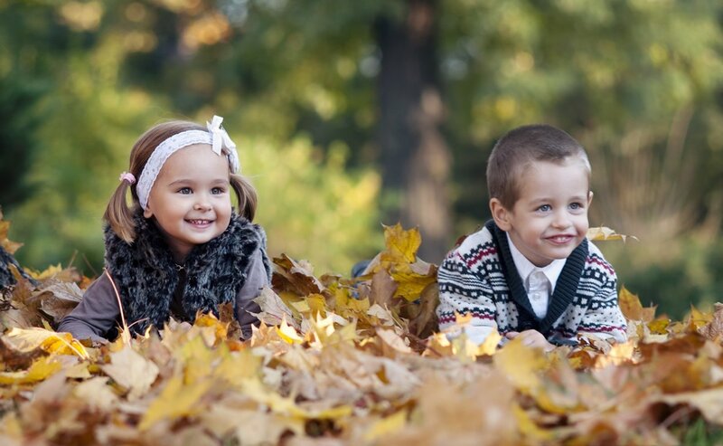 Two Children in Leaves — Yellow