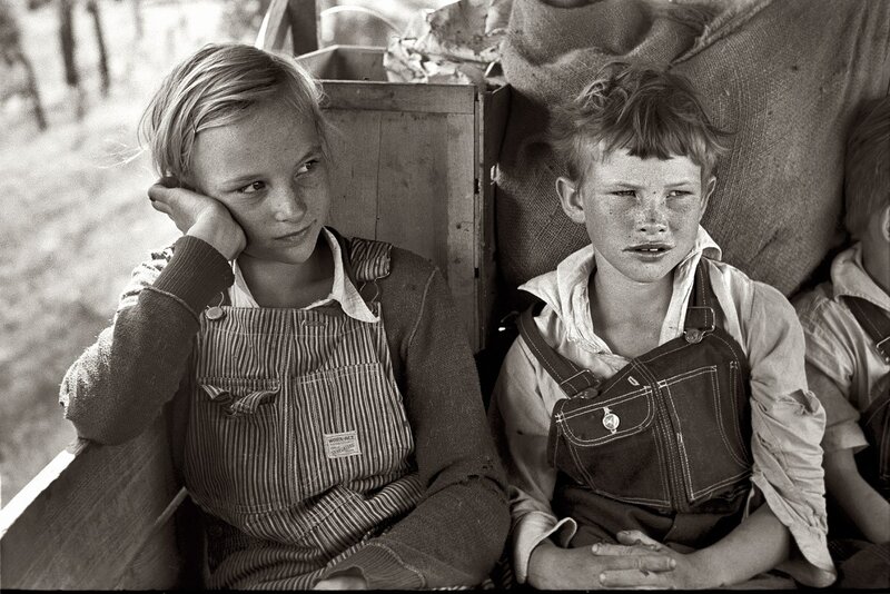 Two children in overalls