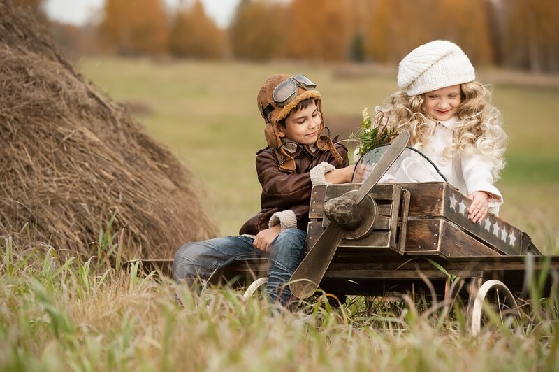 Two Children in Toy Plane