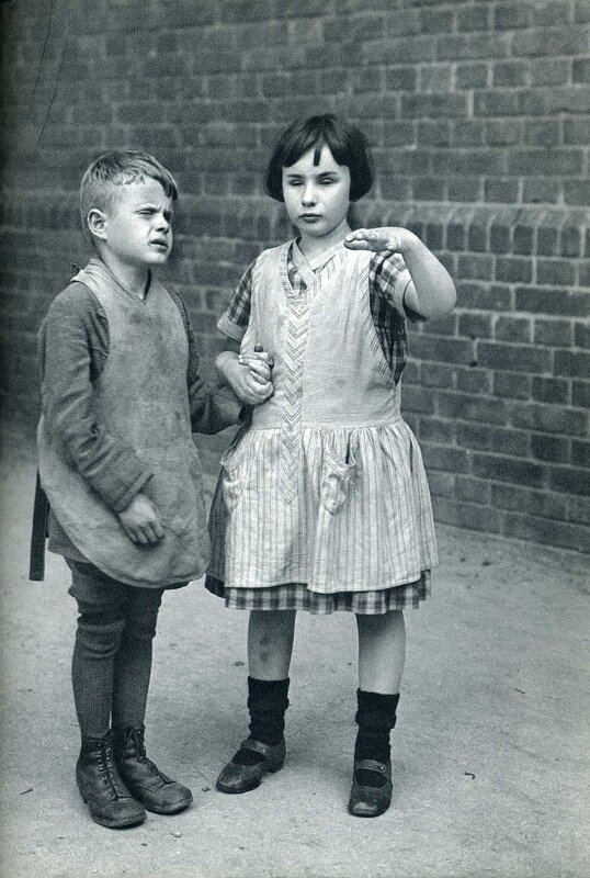 Two children in vintage clothing