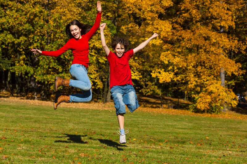 Two Children Jumping