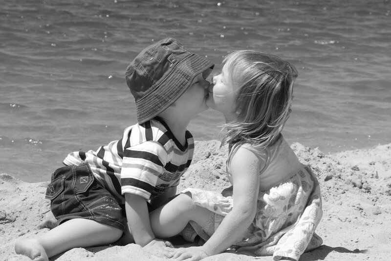 Two Children Kissing — Black, Peaceful