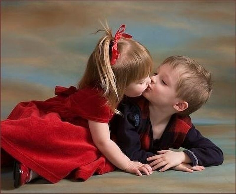 Two Children Kissing — Red, Tender, Photograph