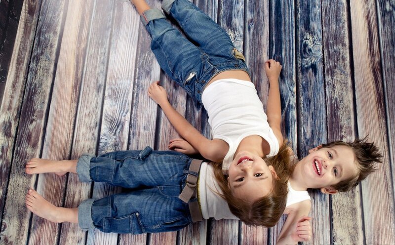 Two Children Lying Down — Blue
