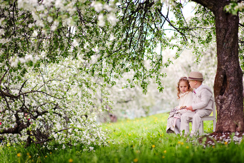 Two Children on Bench — Green, Serene, Spring