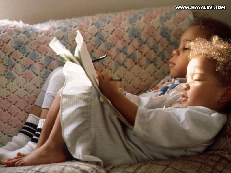 Two Children on Couch