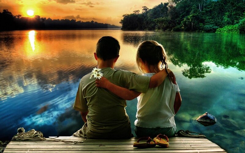 Two Children on Dock — Orange, Serene, Sunset