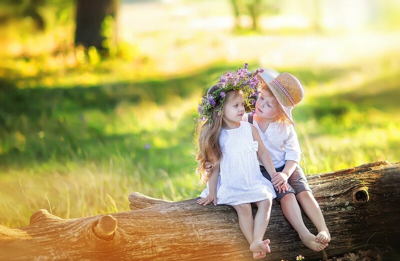 Two Children on Log — Green