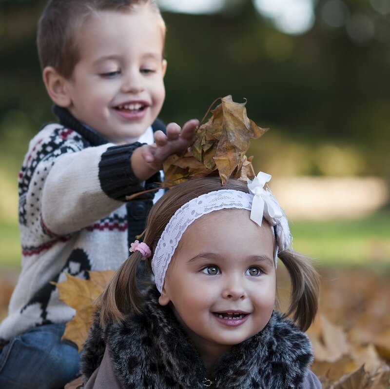 Two Children Playing — Brown, Playful, Autumn