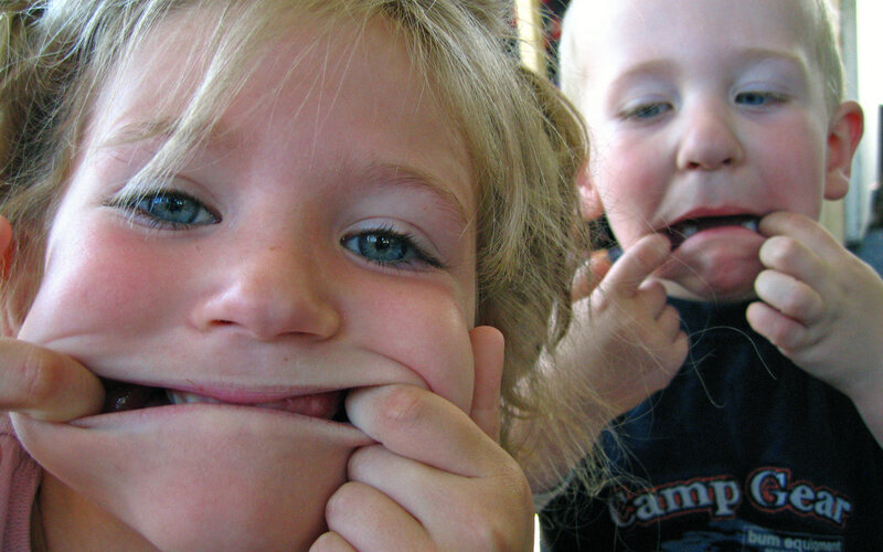 Two Children Pulling Faces