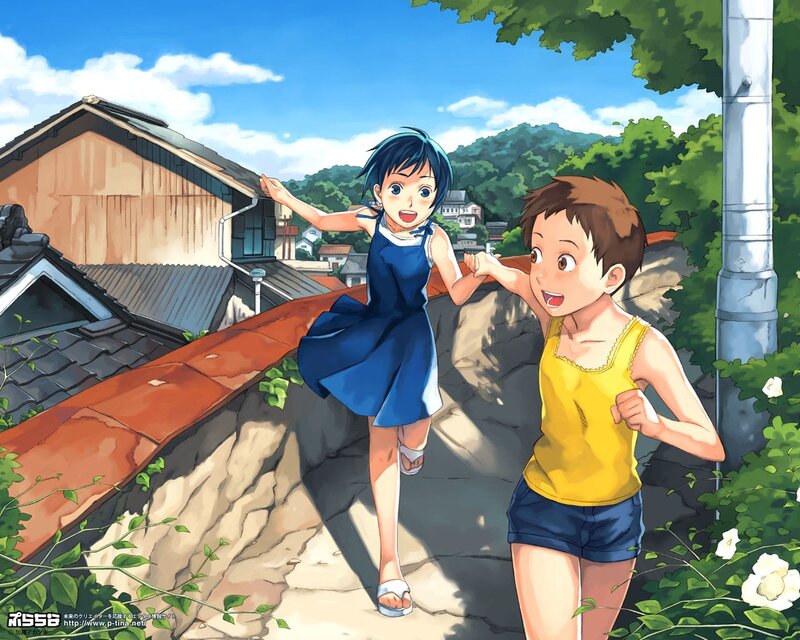 Two children running on a hillside