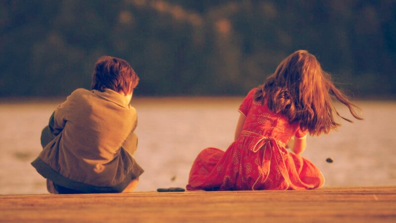 Two Children Sitting — Red