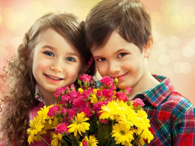 Two Children with Flowers — Yellow, Happy, Photograph