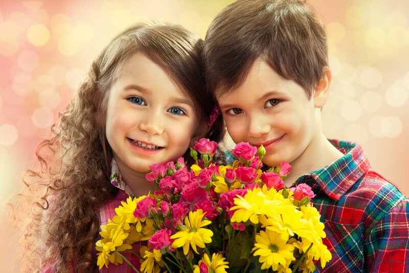 Two Children with Flowers — Yellow, Happy