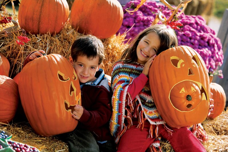 Two Children with Pumpkins