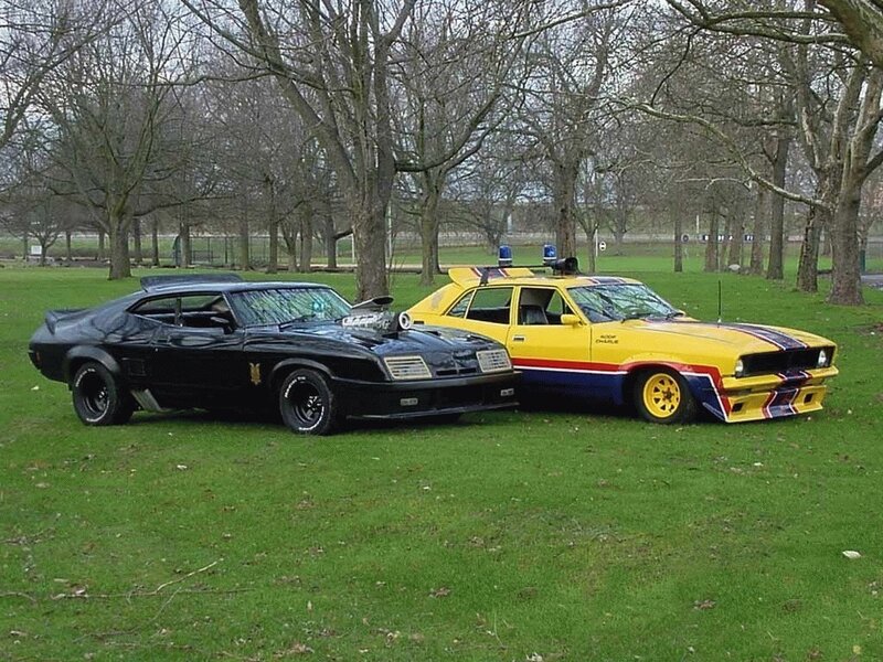 Two Classic Cars in Park