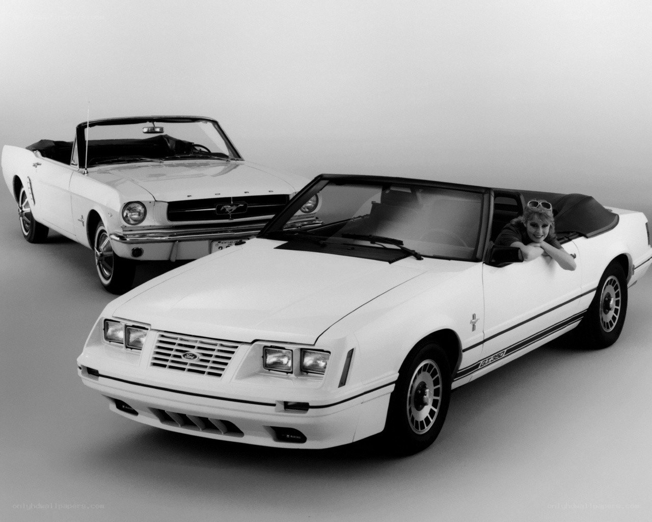 Two classic Ford Mustang convertibles