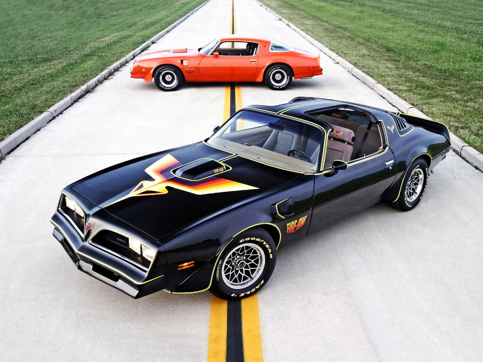 Two classic Pontiac Firebirds