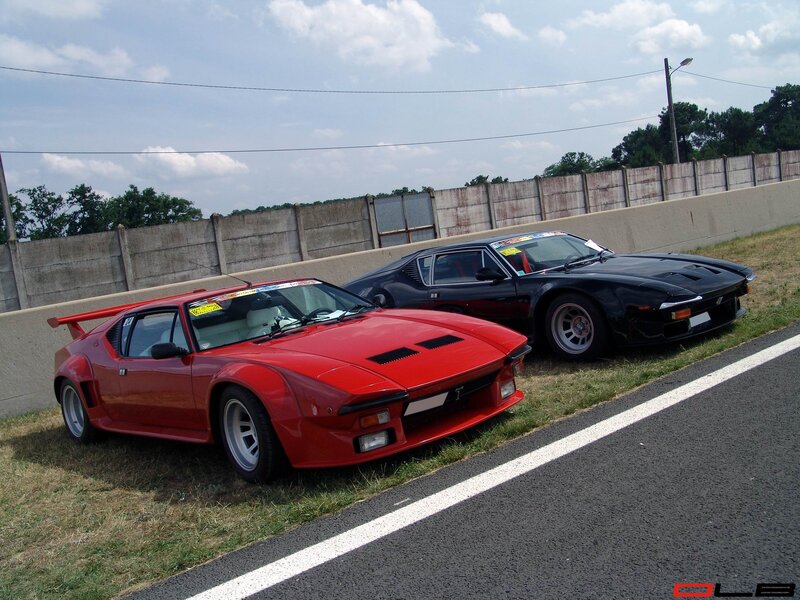 Two Classic Sports Cars — Red