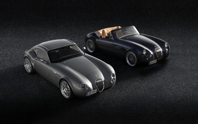 Two classic-style sports cars