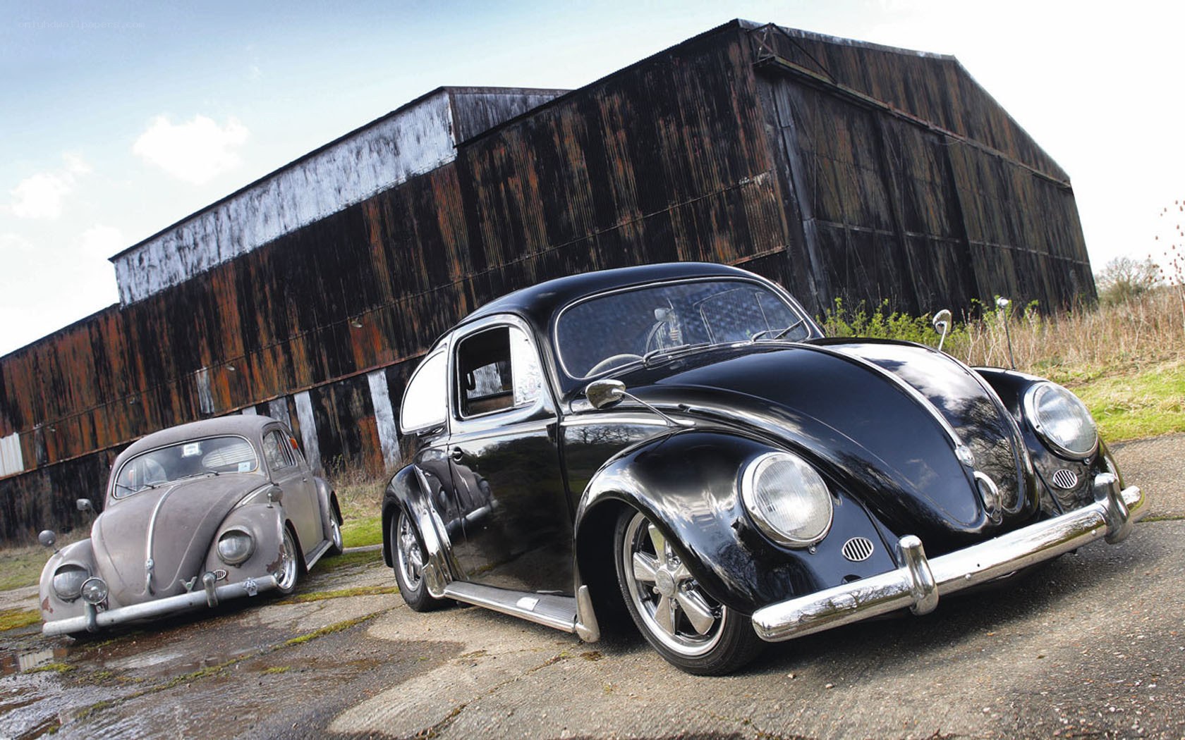 Two classic Volkswagen Beetles