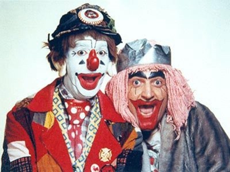 Two clowns posing together