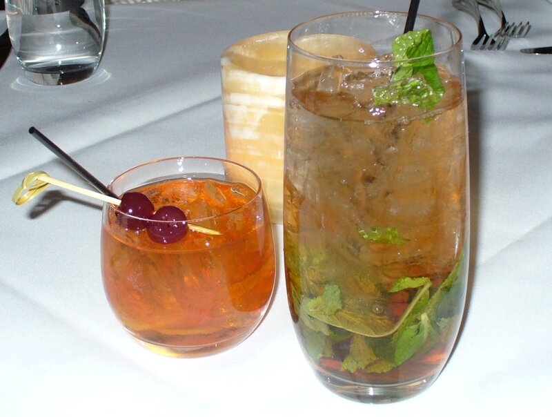 Two cocktails on a table