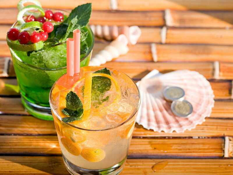 Two cocktails on a wooden table