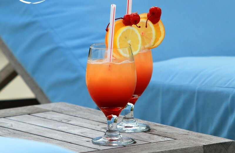 Two Cocktails on Table — Orange