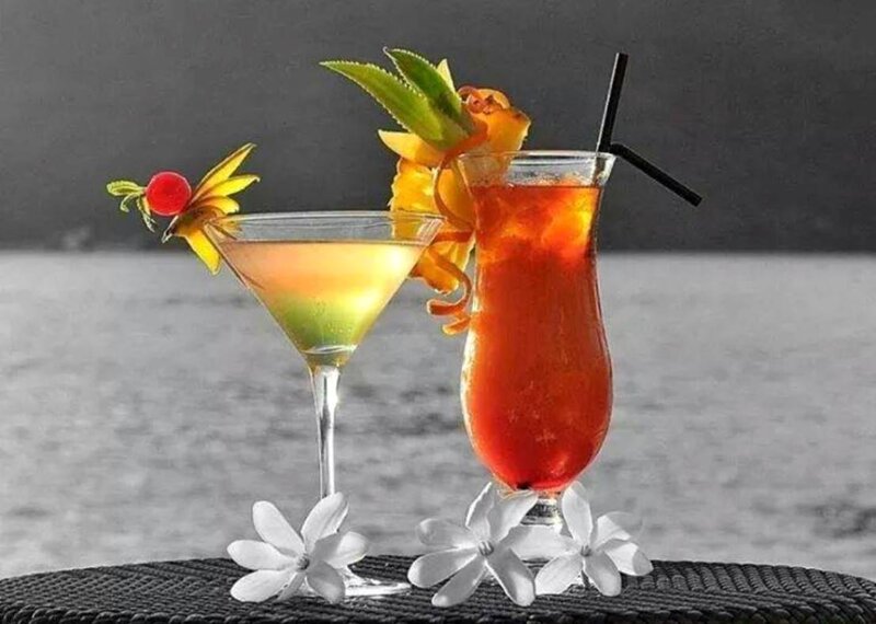 Two Cocktails on Table — Red, Tropical
