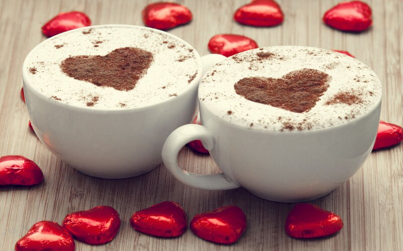 Two Coffee Cups with Hearts