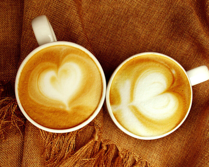 Two Coffee Cups with Latte Art — Brown