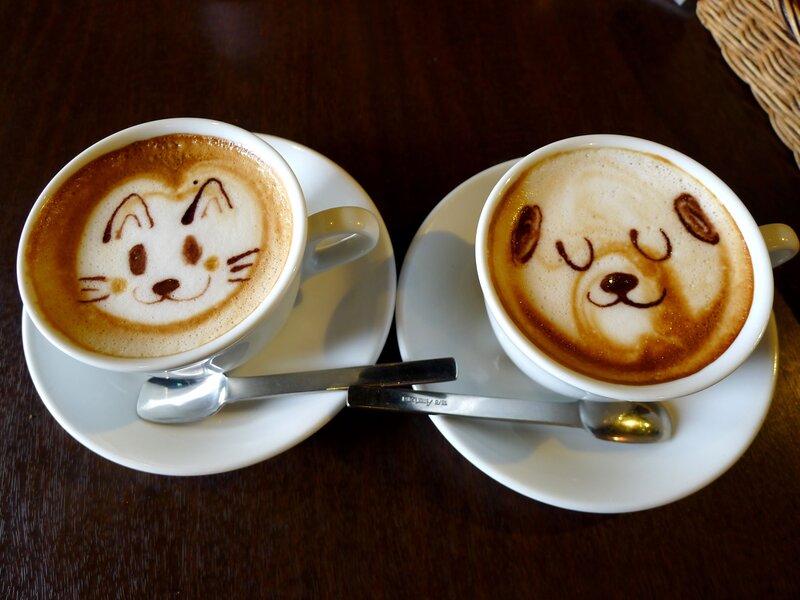 Two Coffee Cups with Latte Art