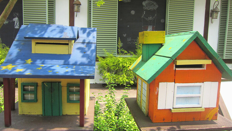 Two Colorful Birdhouses