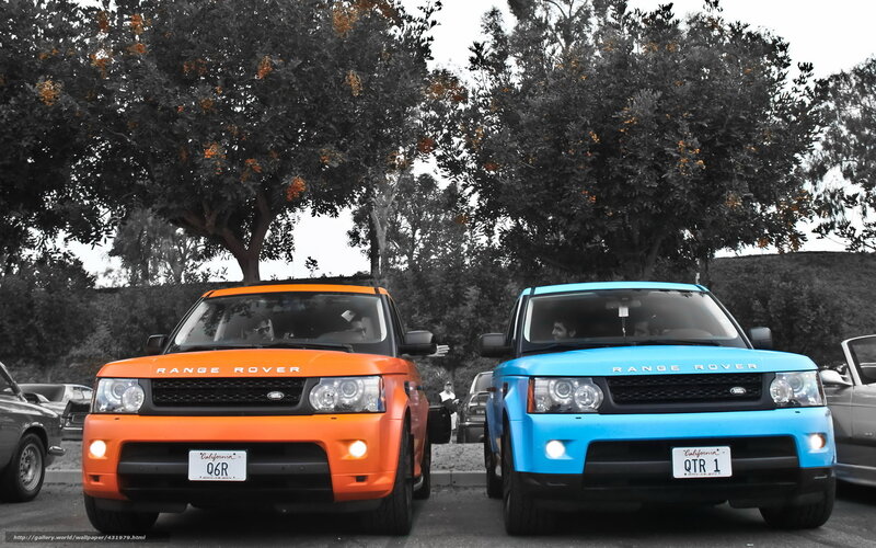 Two colorful Range Rovers