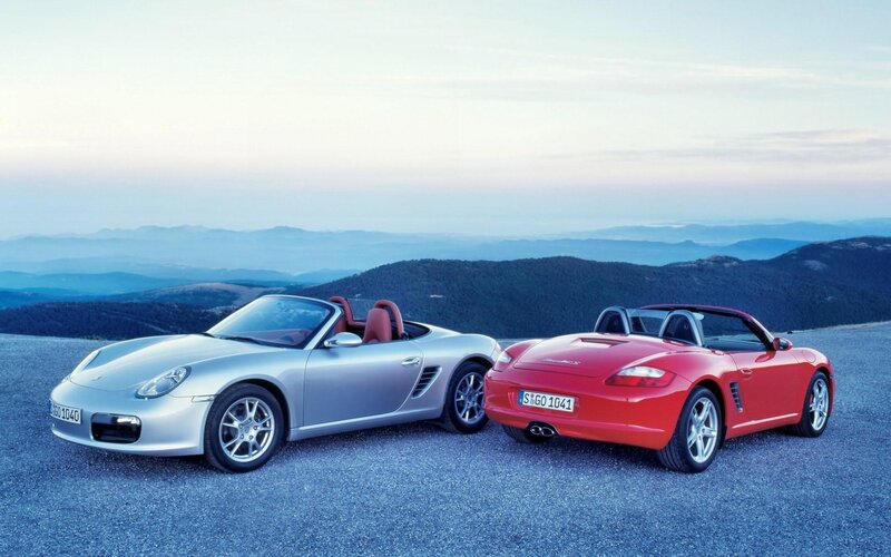 Two Convertible Sports Cars — Silver
