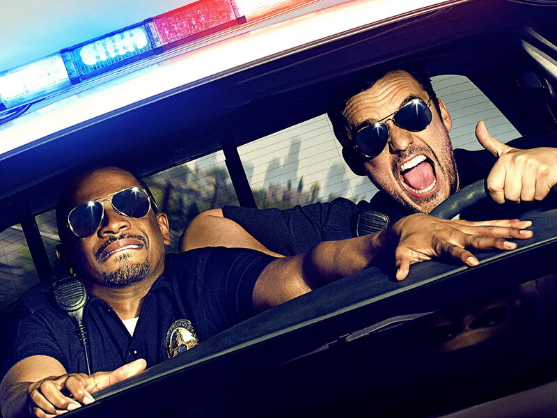 Two cops in a police car