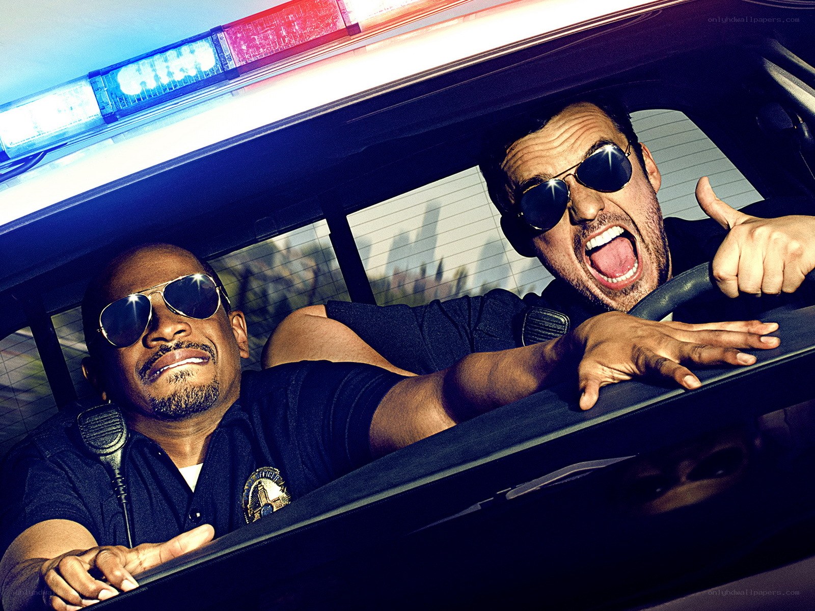Two cops in a police car