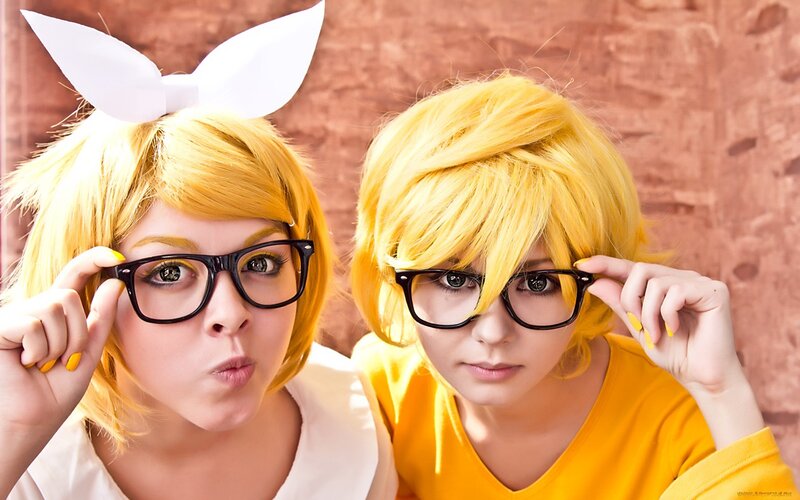 Two Cosplayers in Yellow Wigs
