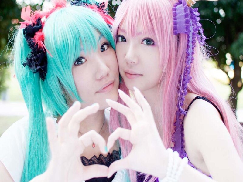 Two Cosplayers Making Heart