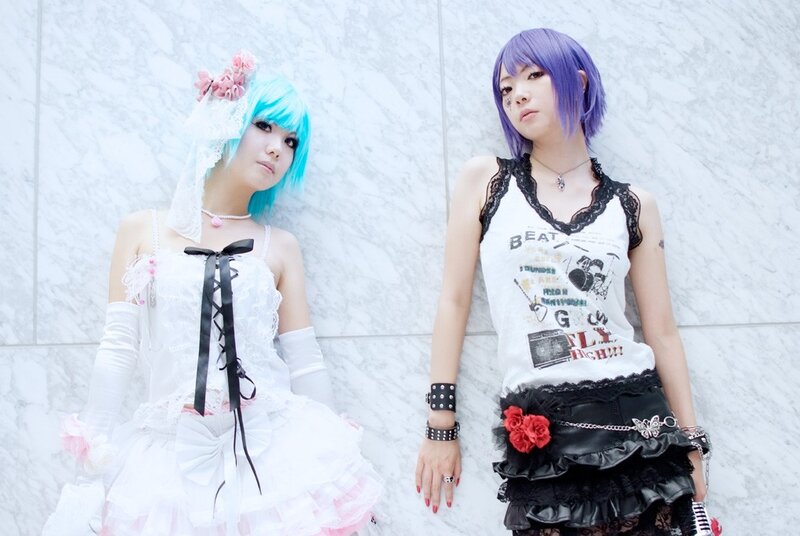 Two cosplayers posing together