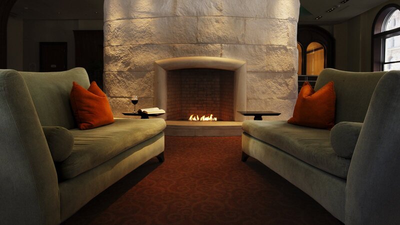 Two Couches by Fireplace