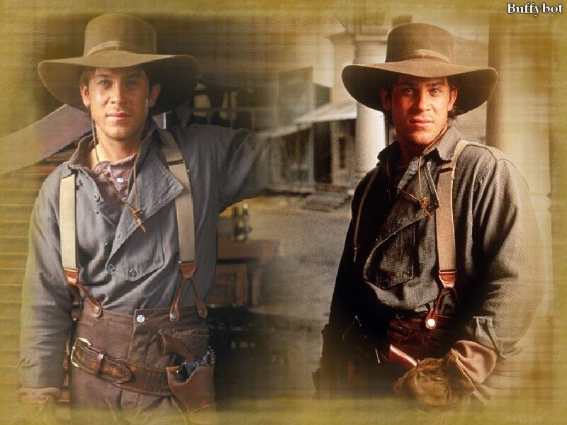 two cowboys in a western town