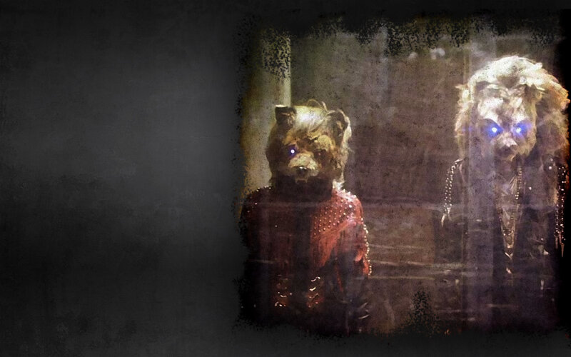 two creatures in dark room