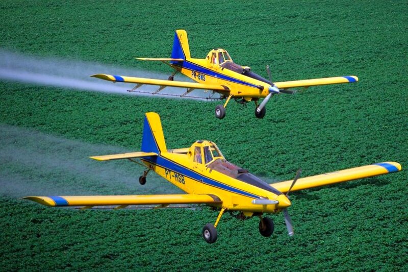 Two Crop Duster Planes