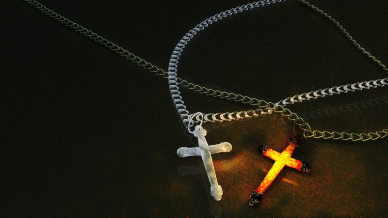 Two Crosses on a Chain