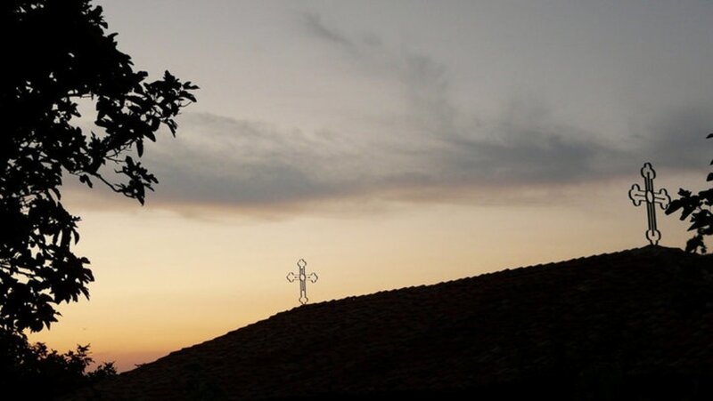 Two Crosses on Roof
